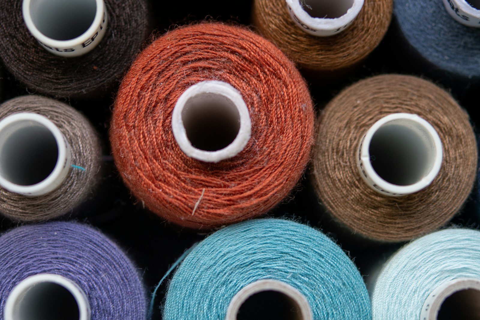 Thread spools for garment manufacturing